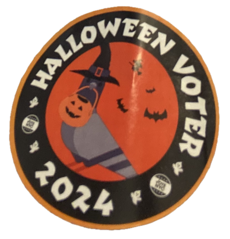 A sticker that says Halloween
Voter 2024. In the middle, there is a picture of a pigeon, wearing a witch’s
hat and holding a pumpkin trick-or-treat basket in its beak, while bats
and such fly around in the background.